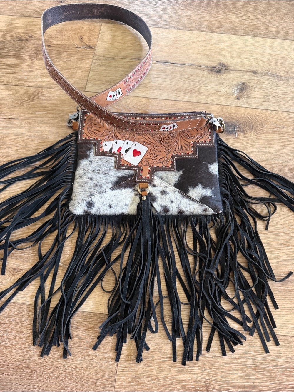 Fringed Cowhide Crossbody Bag with Tooled Leather and Playing Card Accent